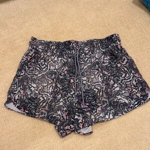 Athleta Black and Pink Patterned Crossroads Athletic Shorts